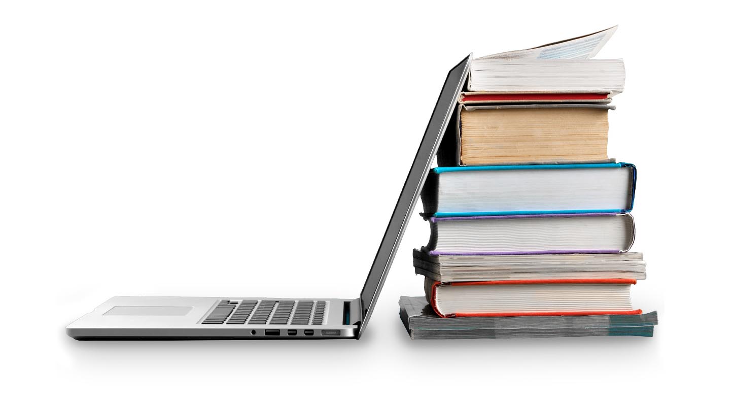 laptop and stack of books